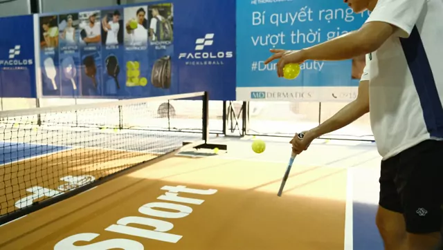 A player practising a serve